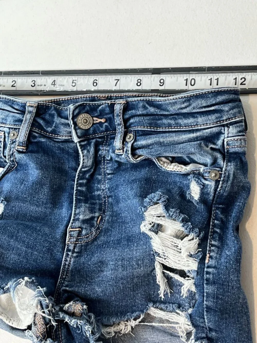 American Eagle Hi Rise Distressed Denim Shorts Size 2 Raw Hem Festival
